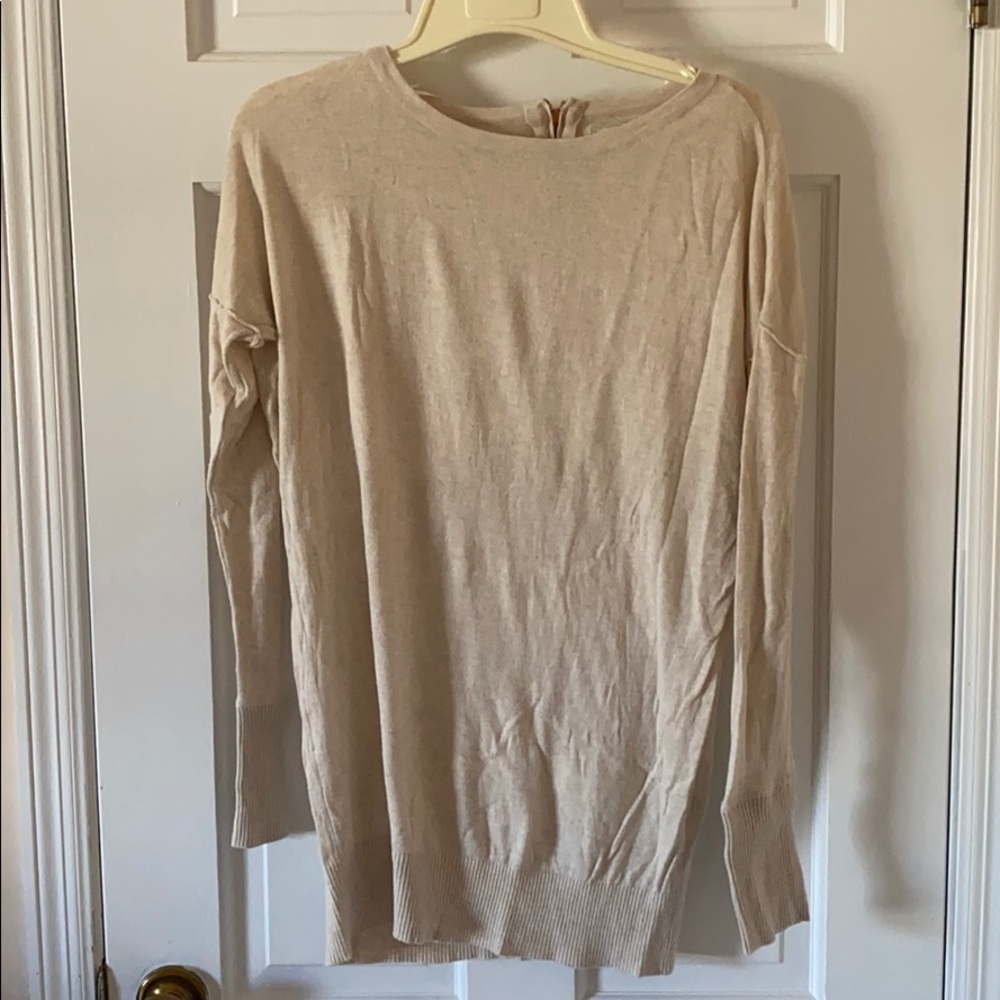 Lightweight cream-colored long sleeve sweater